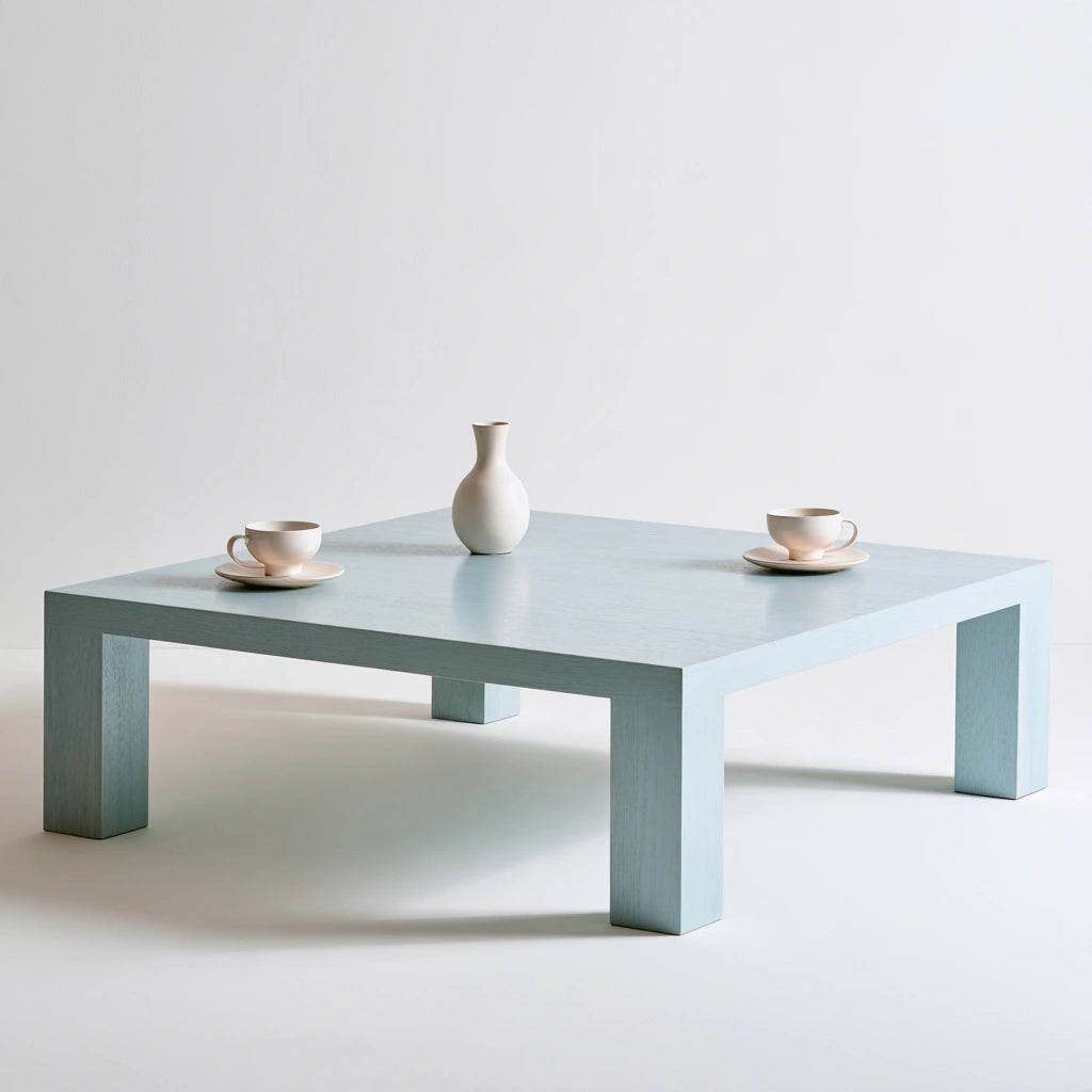 Table basse aux lignes épurées, coloris bleu clair et blanc