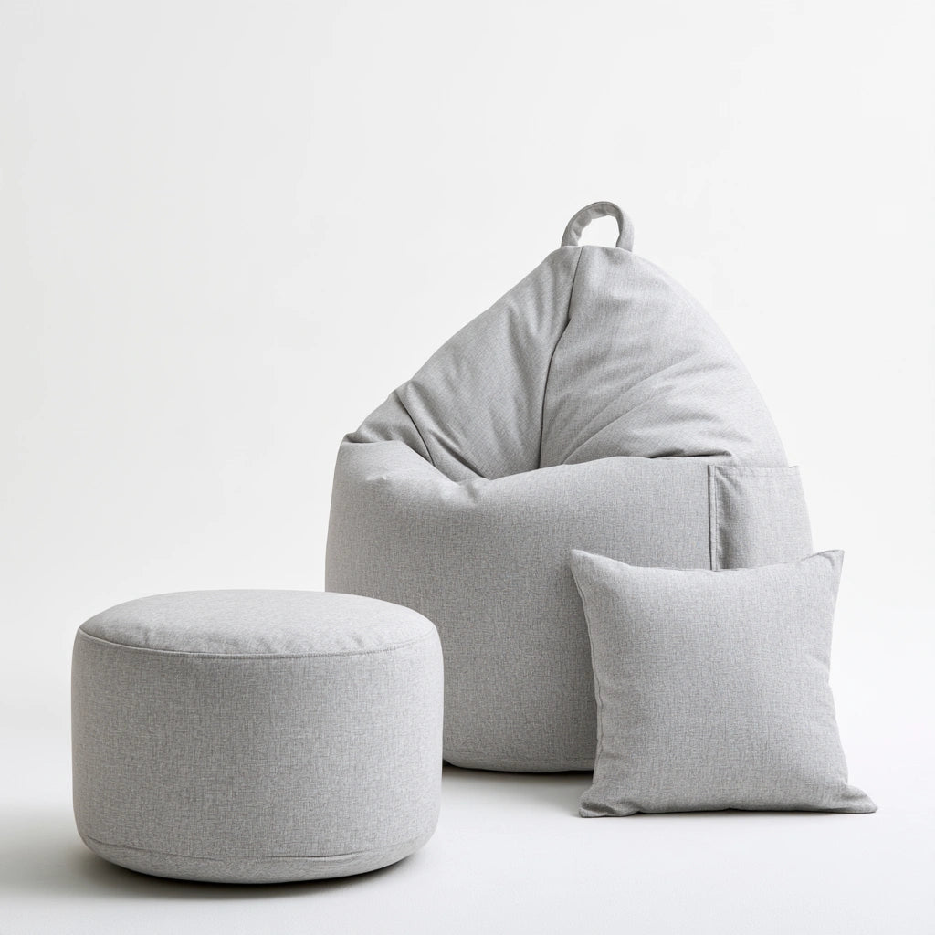 Pouf fauteuil avec poignée aux lignes épurées, coloris gris clair