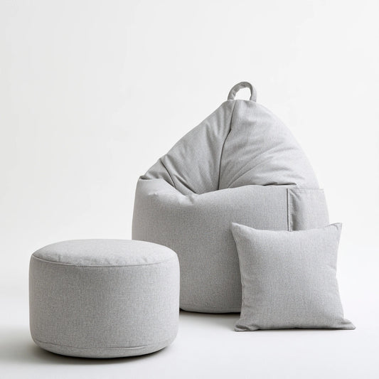 Pouf fauteuil avec poignée aux lignes épurées, coloris gris clair